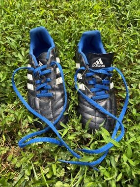 adidas Kids Black cleats with Blue Accents